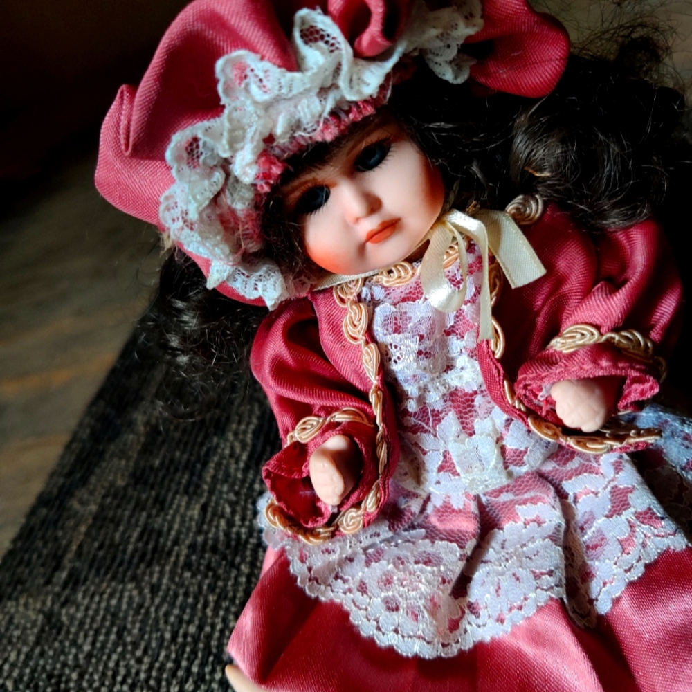 Pink and White Doll with Frilly Bonnet and Floral Dress